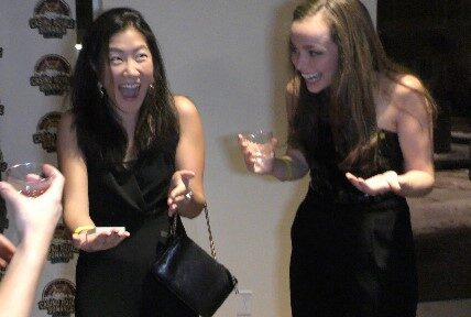 excited specators watch Boston Magician The Best in Magic Entertainment The Best in Magic Entertainment The surprised look on spectators faces in reaction to cpose up magic