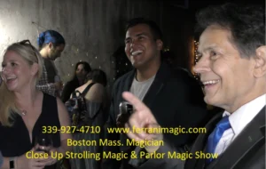 The Best in Magic Entertainment Smiling Massachusetts Magician Joe Ferranti with smiling spectators