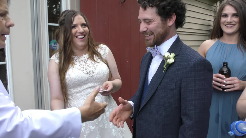 The Best in Magic Entertainment Boston Massachusetts Wedding Magician Joe Ferranti performs for the happy bride and groom