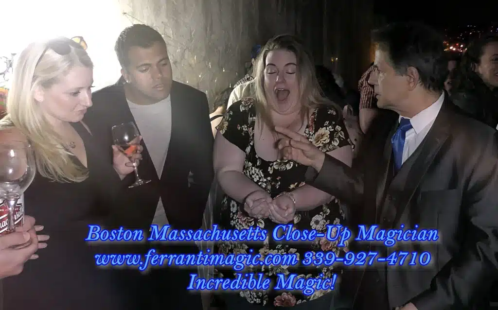 Boston, Massachusetts magician Joe Ferranti entertains in the North End of Boston. Delighted and laughing spectators confirm the fun.