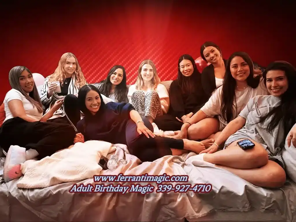 Birthday magician Joe Ferranti entertains a group of young women celebrating a special day.