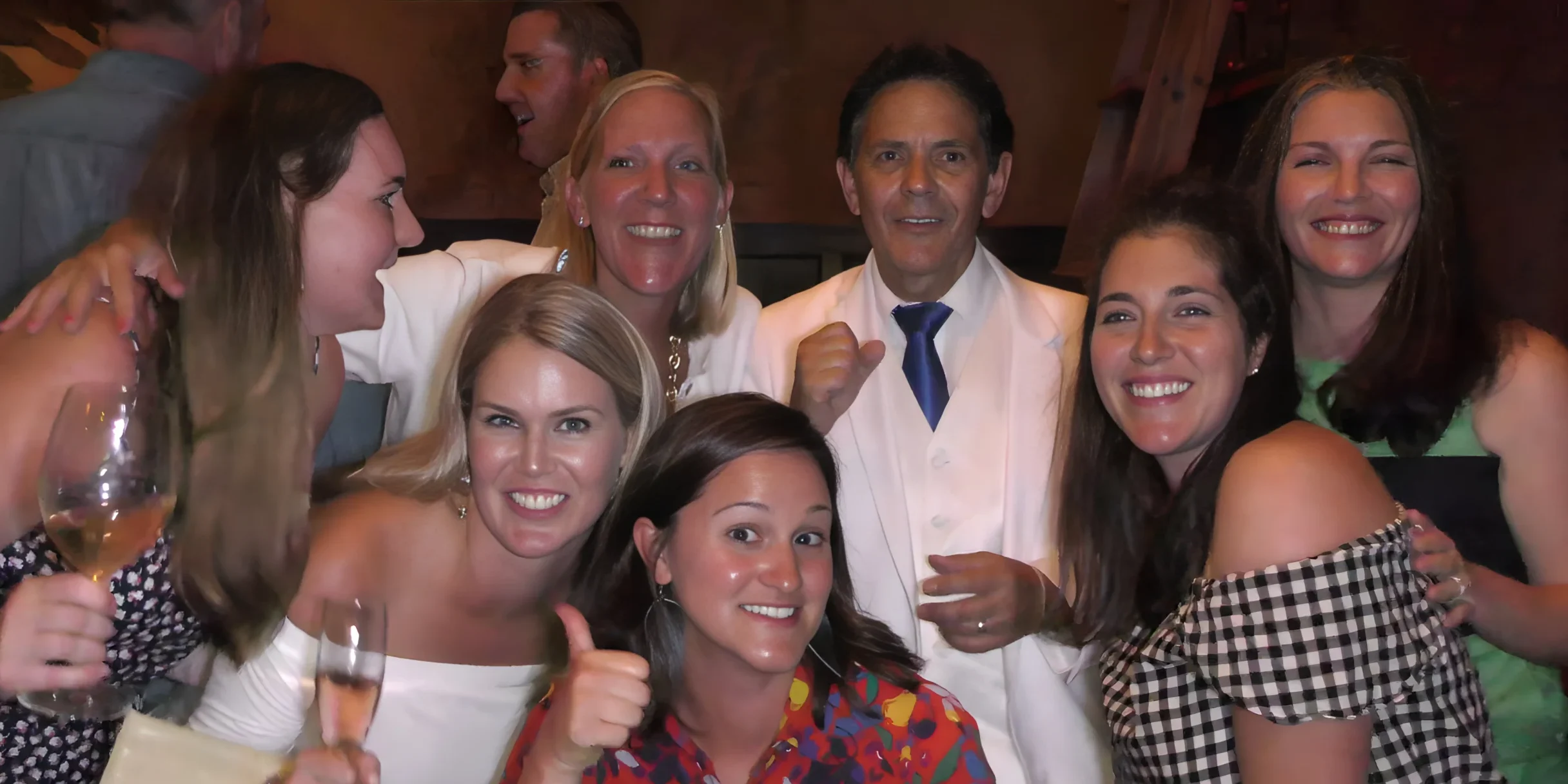 Boston Magician Joe Ferranti poses with female clients who approve of the magic!