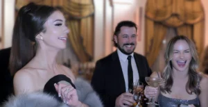 Close-up magician creating strong reactions for guests at a corporate cocktail hour