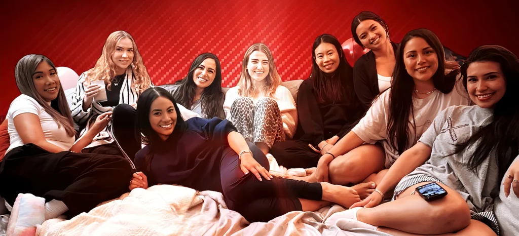 Guests pose for a photo following an intimate parlor magic show in a private apartment.