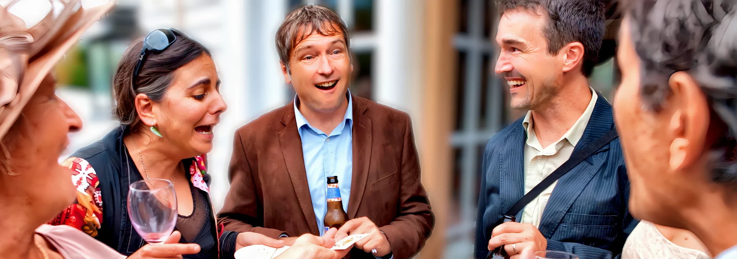 “Guests in Boston reacting with surprise and laughter during walk-around magic.”