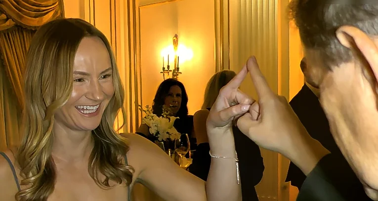 Boston magician, Joe Ferranti making connections with guests at a wedding reception.
